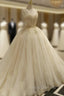 Champagne Ball Gown Tulle Spaghetti Straps Backless Wedding Dress