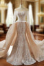 Champagne Mermaid Lace Long Sleeve Backless Train Wedding Dress