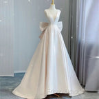 Chic Ball Gown V neckline Sleeveless Ivory Satin Long Wedding Dress With Bow